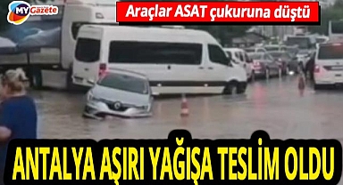 Antalya Pınarlı Kavşağı'nda yağmur çilesi! ASAT’ın açtığı çukuru araçlar gömüldü