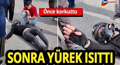 Yaralı motosiklet sürücüsünden örnek davranış! Her şeyden önemlisi çocuk