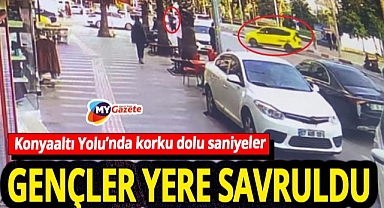 Antalya’da taksi ile motosiklet çarpıştı! 2 genç yaralandı, korkunç kaza kamerada