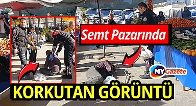 Pazar yerinde yerde hareketsiz yatan şahıs hastaneye kaldırıldı