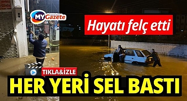 Sağanak yağışla iş yerlerini sular bastı, araçlar mahsur kaldı
