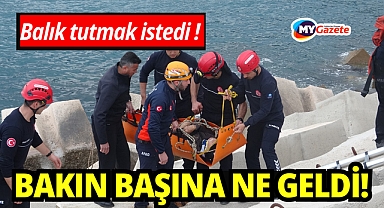 Balık tutmak için gittiği dalga kıranda düşerek mahsur kaldı