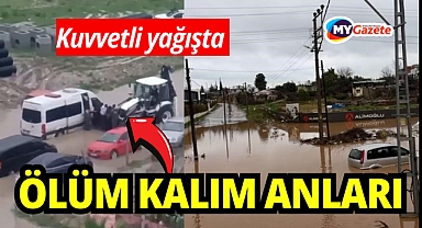 Kuvvetli yağışta minibüste mahsur kaldılar: Bakın nasıl kurtarıldılar!