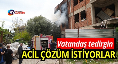 Antalya'da çöp dolu metruk bina yangını: Vatandaşları tedirgin eti