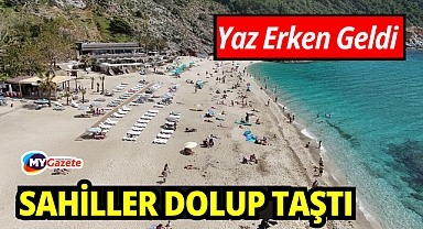 Havalar 24 dereceye çıktı, Antalya'da sahiller doldu