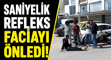 Bisikletli çocuğa çarpmamak için motosikletini devirip yaralandı
