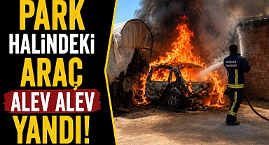 Antalya Kumluca'da seraların arasında alev alan otomobil küle döndü
