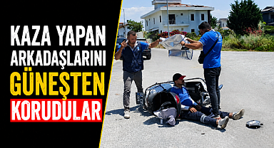 Antalya Manavgat'ta kaza yapan mesai arkadaşlarını güneşten korumaya çalıştılar