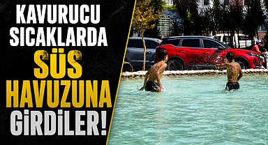 Antalya sıcağında çocuklar çareyi süs havuzunda buldu