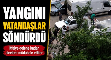 Park halindeki araçta korku dolu anlar! Yangını vatandaşlar söndürdü