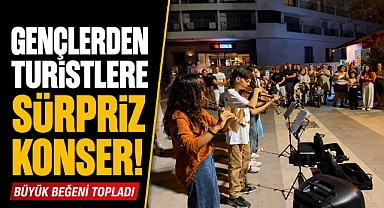 Antalya'da Kemer sokakları müzikle renklendi! Gençlerden turistlere sürpriz konser